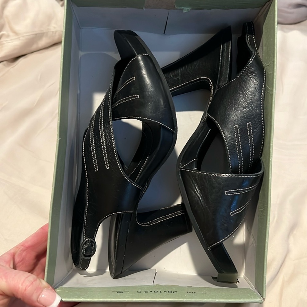 Clark’s artisan collection (NAVAN) size 8. Worn once, can no longer wear heels.